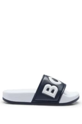 Kids' color-blocked slides with contrast logo