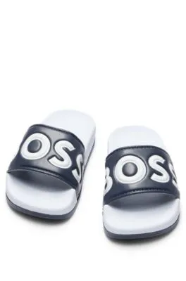 Kids' color-blocked slides with contrast logo