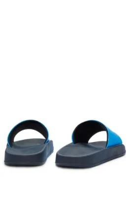 Slides with logo-branded straps